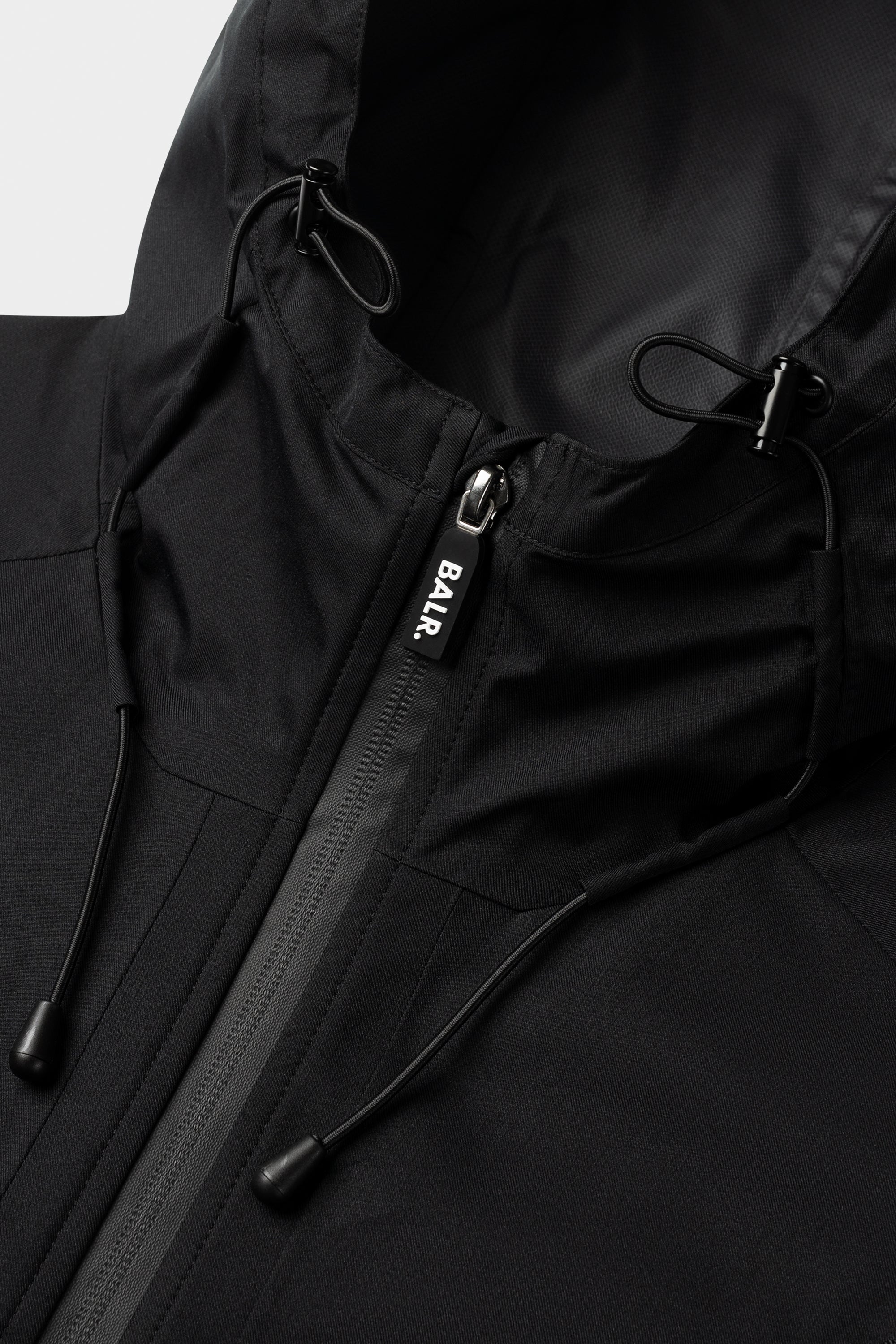 Hex Badge Rain Jacket Jet Black