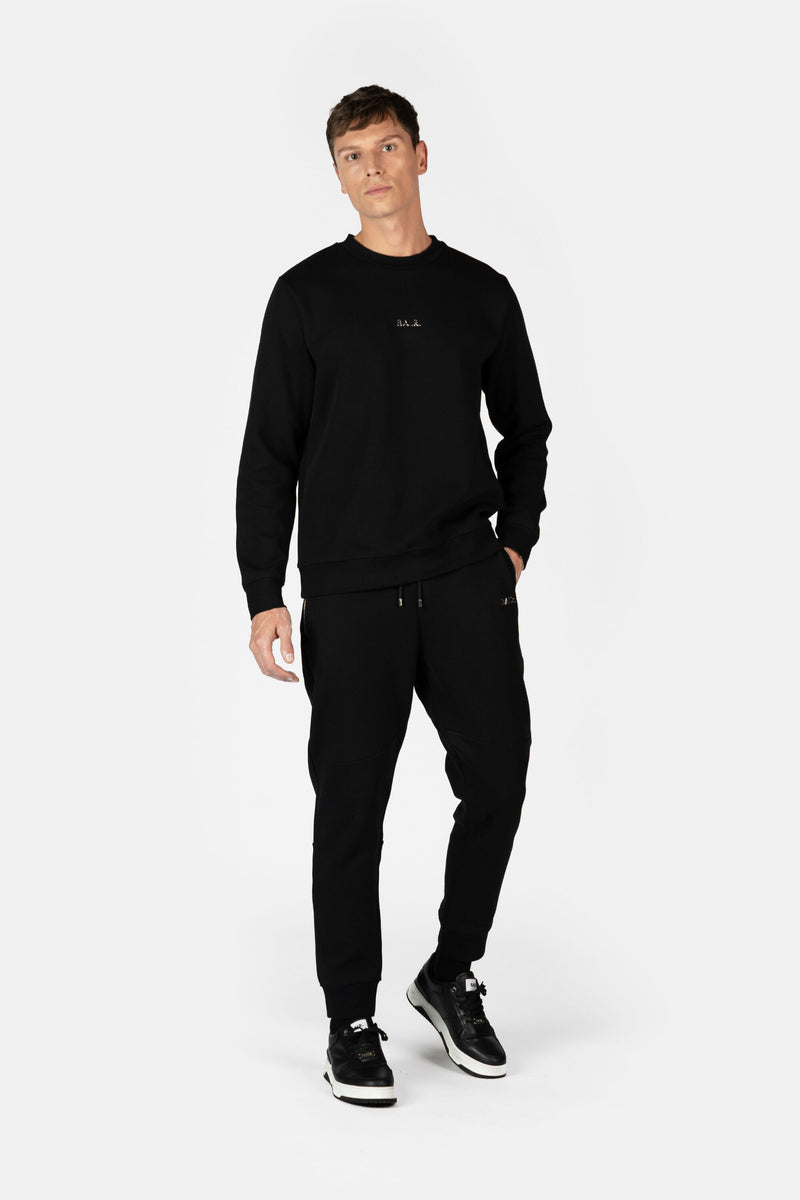 Regular de la serie Q Fit Persona que practica jogging Jet Black